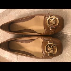 Michael Kors tan flats.